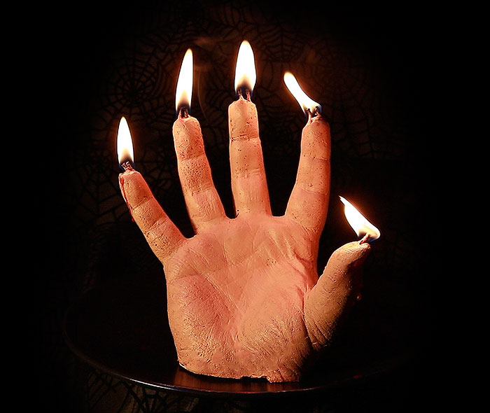 sviečka ruka